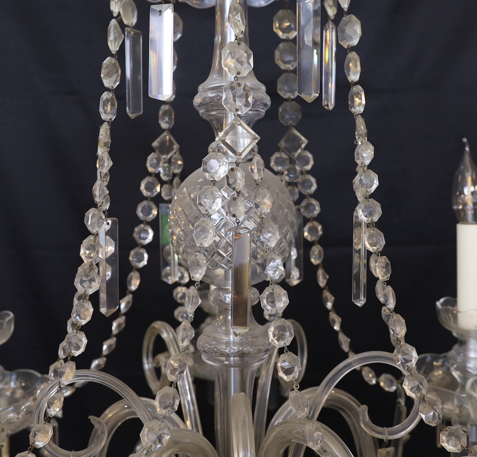 A 1930s Czech cut glass five light chandelier with octagonal bead and bayonet drops, height 100cm. width 65cm